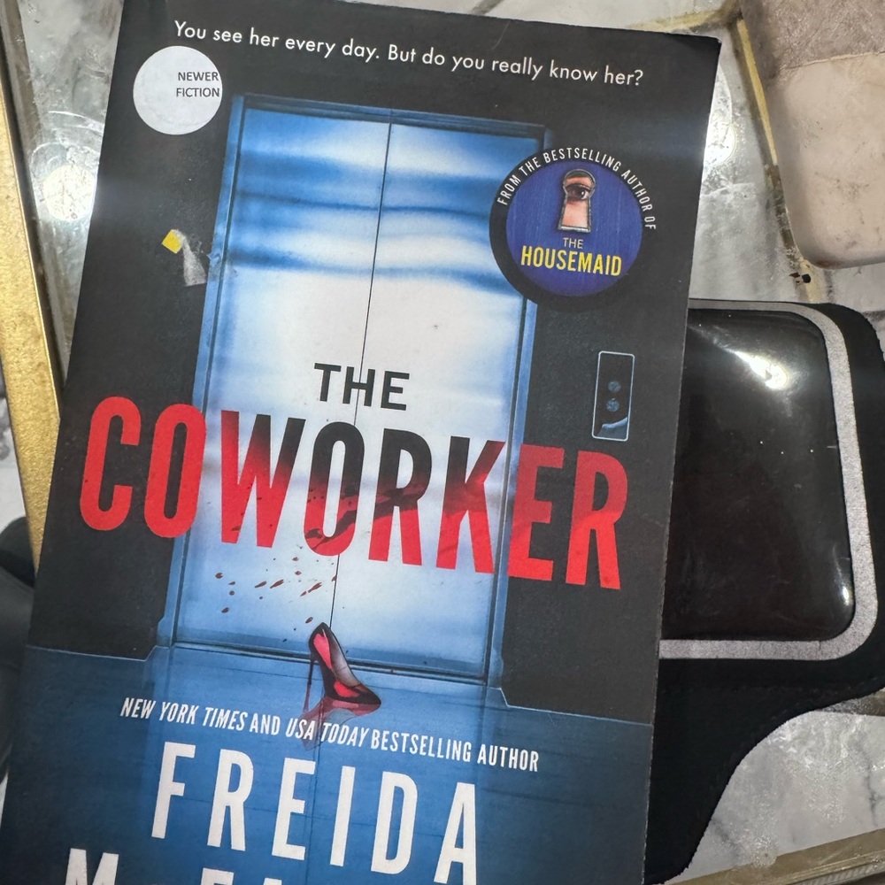 The Coworker by Freida McFadden - Thriller Paperback - Blue & Black Cover